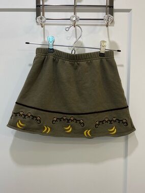 Toffee Apple Olive Skirt with Embroidered Monkey and Banana Design, Size 5 Girls